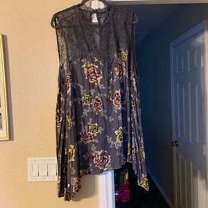 Floral and lace blouse.